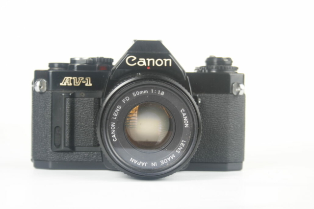 Canon AV-1 black finish 35mm SLR camera. 1979. Japan.