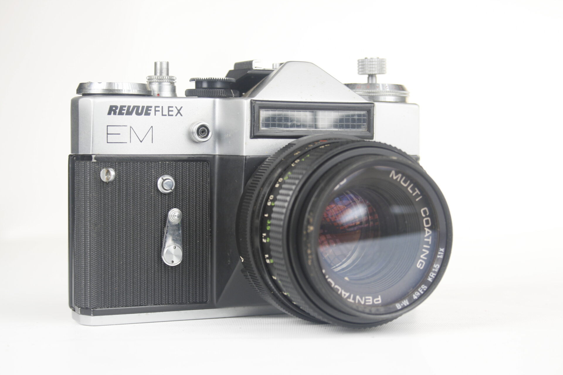 Revueflex EM (Uitgegeven door Foto-Quelle) Zenit EM. 35mm SLR camera. 1972-1984. USSR.