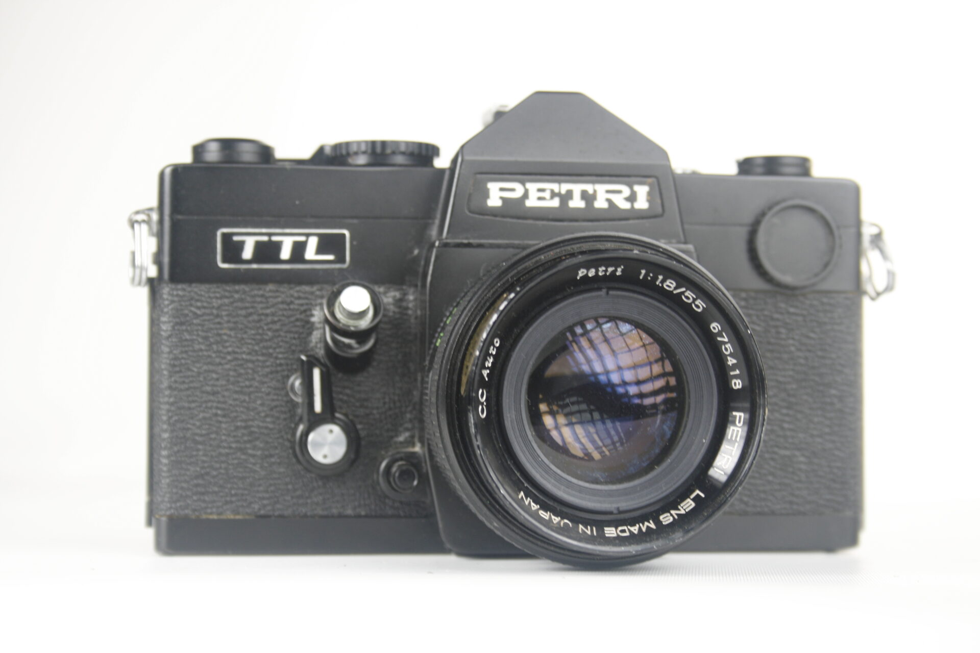 Petri TTL (FTX). 35mm SLR camera. Ca. 1974. Japan. Black