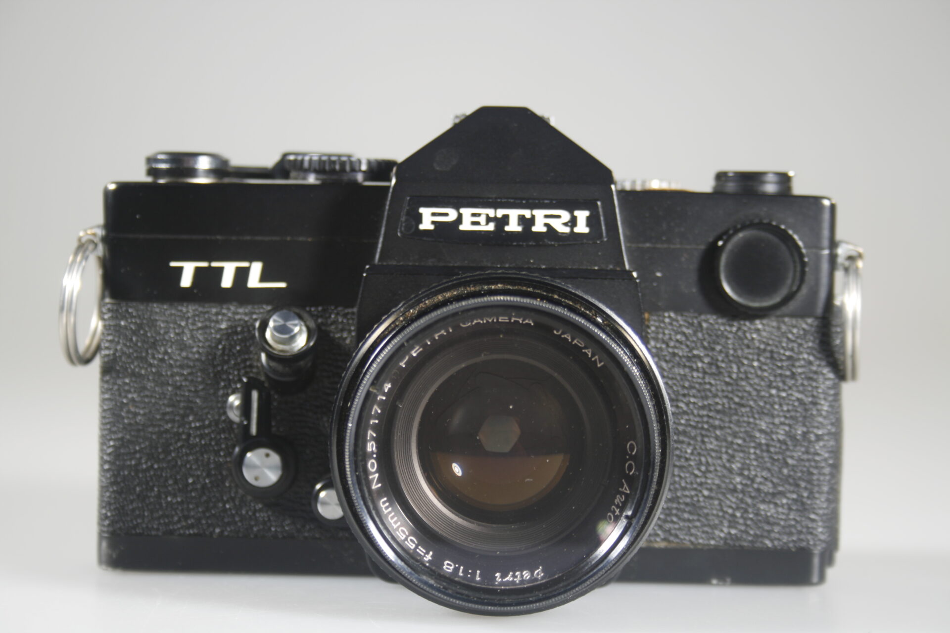 Petri TTL (Petri FTX). SLR camera. 35mm film. 1974. Japan. Zwart