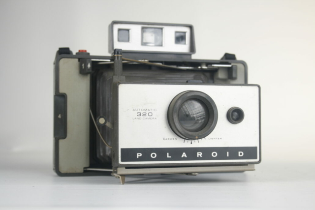 Polaroid Land Camera Automatic. Model 320. 100 Series Packfilm. 1969-1971. USA